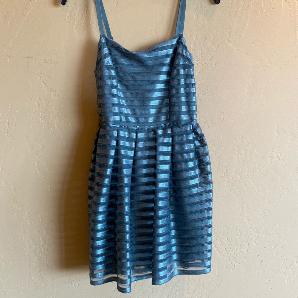 Mini dress with gold zipper on back
